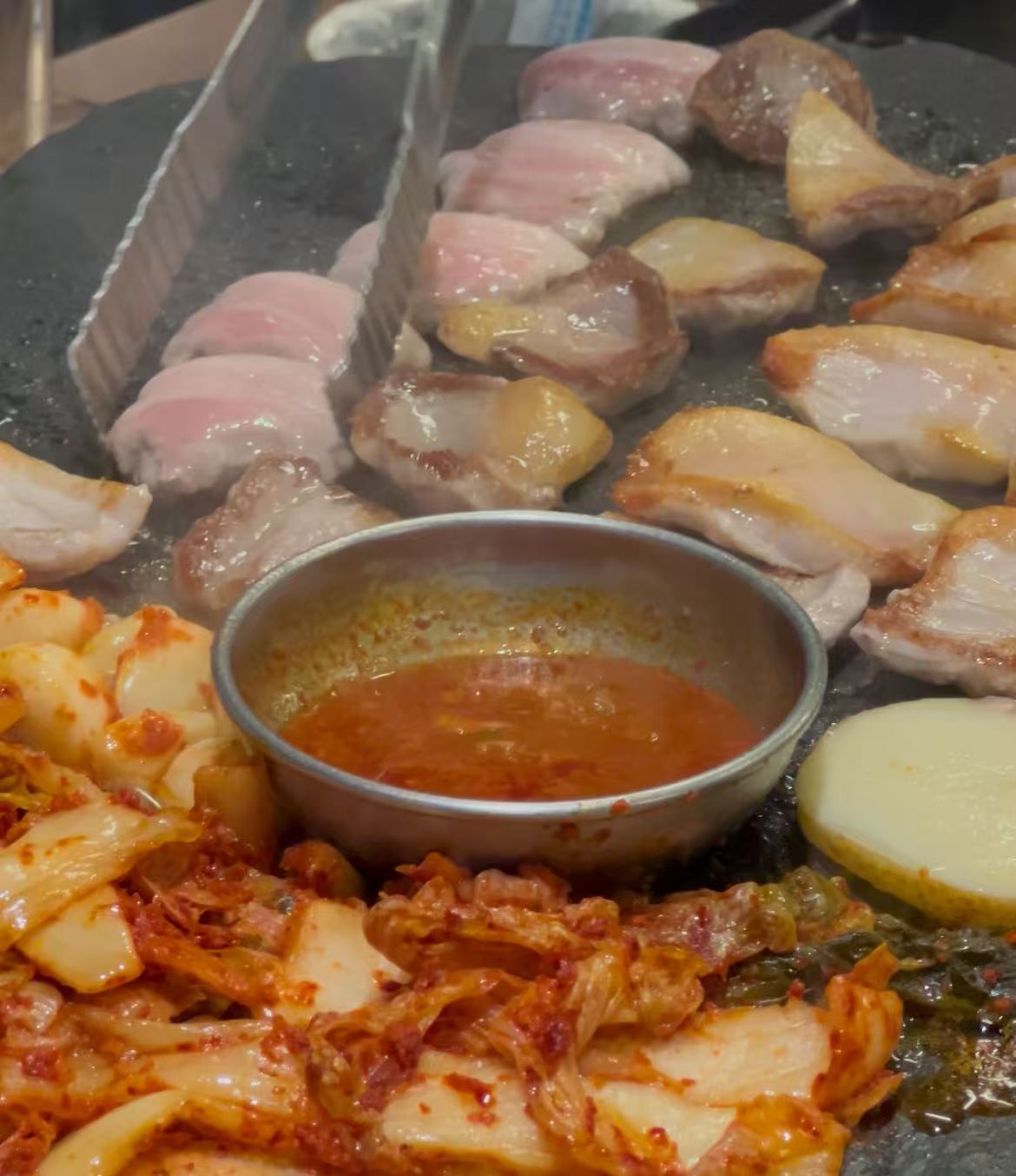 Fresh samgyeopsal preparation Fresh pork belly slices ready for grilling
