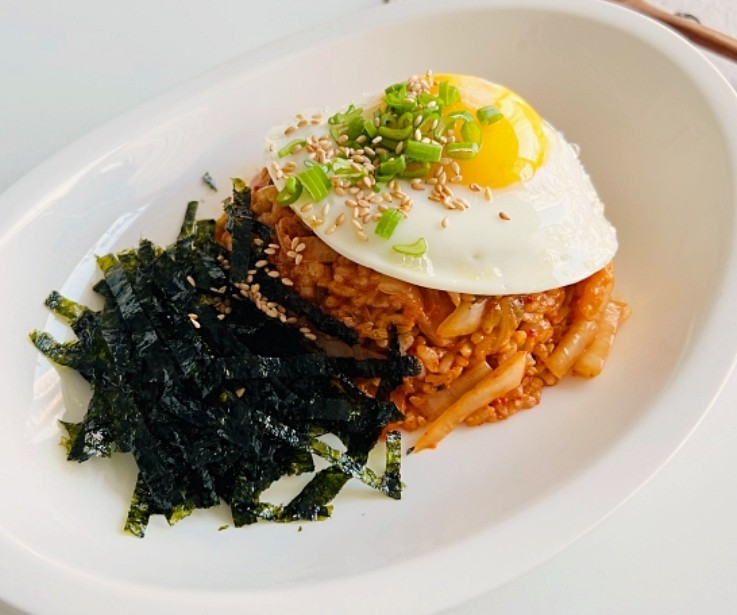 Gochujang Mayo Kimchi Fried Rice with perfectly cooked eggs