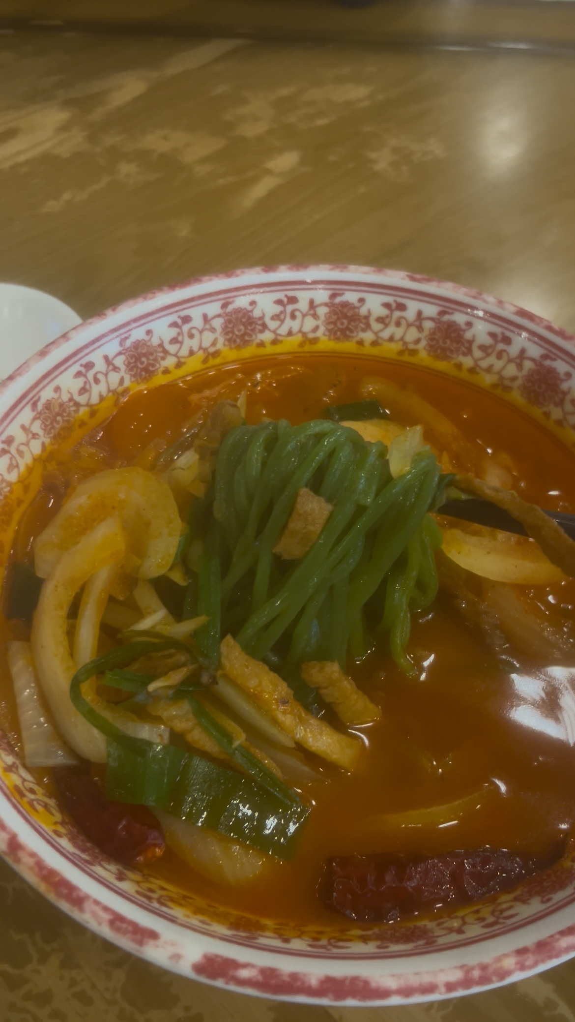 Close-up of the rich broth and ingredients in the Jjampong